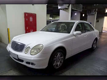 Mercedes-Benz  E-Class  280  2006  Automatic  80,000 Km  4 Cylinder  Rear Wheel Drive (RWD)  Sedan  White