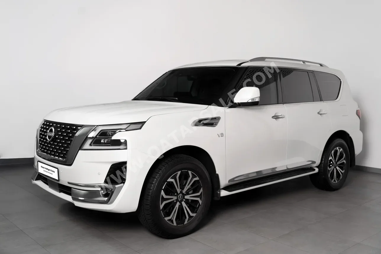 Nissan  Patrol  LE Titanium  2024  Automatic  6,095 Km  8 Cylinder  Four Wheel Drive (4WD)  SUV  White  With Warranty