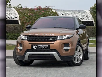 Land Rover  Evoque  Dynamic HSE  2015  Automatic  114,500 Km  4 Cylinder  All Wheel Drive (AWD)  SUV  Bronze