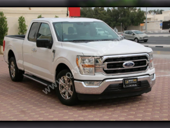 Ford  F  150  2021  Automatic  59,000 Km  6 Cylinder  Rear Wheel Drive (RWD)  Pick Up  White