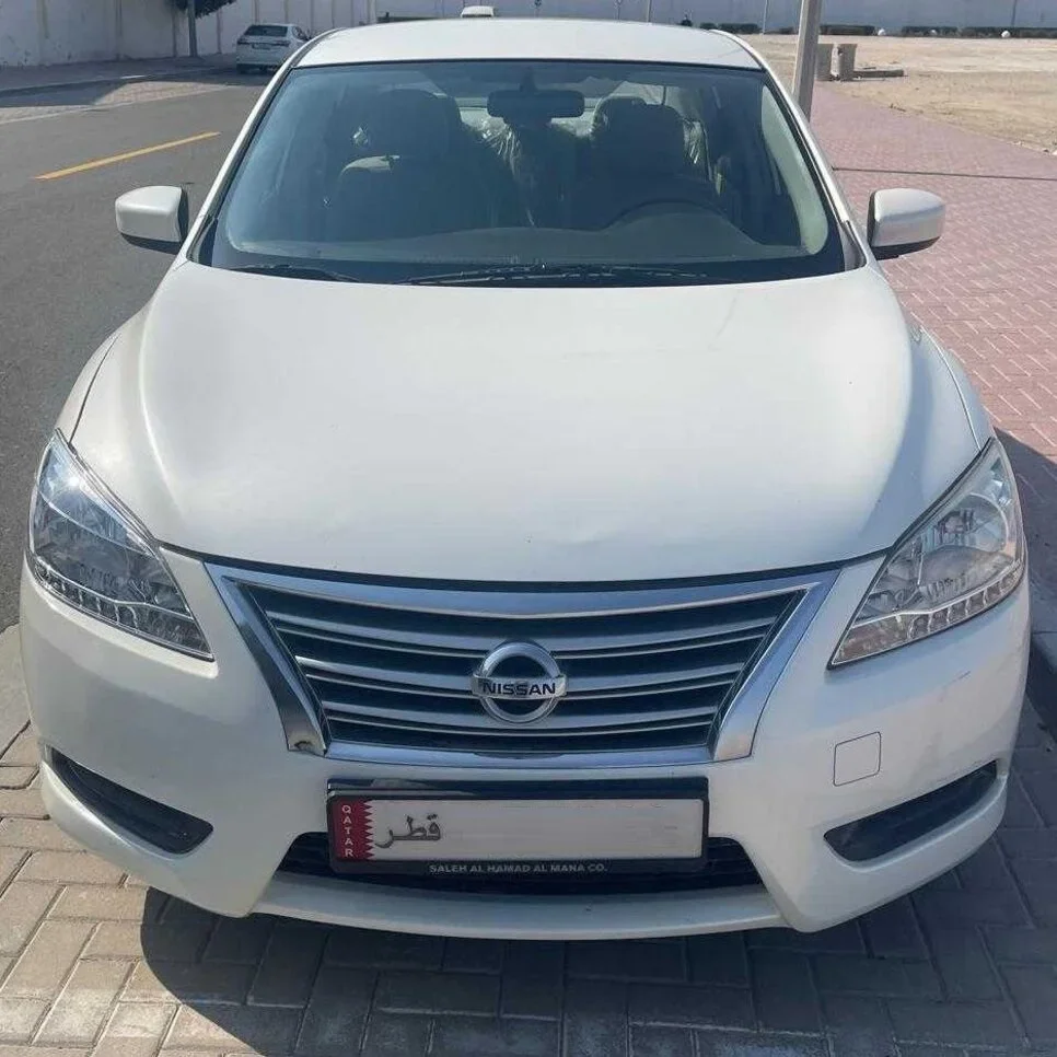 Nissan  Sentra  2016  Automatic  107,000 Km  4 Cylinder  Front Wheel Drive (FWD)  Sedan  White