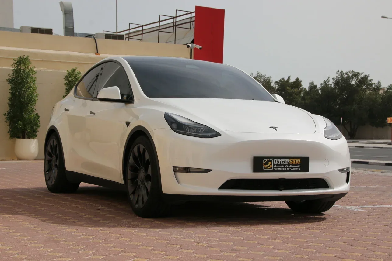 Tesla  Model Y  Performance  2023  Automatic  65,000 Km  0 Cylinder  All Wheel Drive (AWD)  Sedan  White  With Warranty