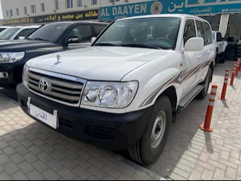 Toyota  Land Cruiser  GX  2006  Manual  322,000 Km  6 Cylinder  Four Wheel Drive (4WD)  SUV  White