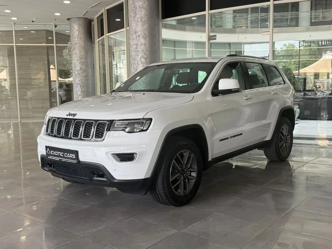 Jeep  Grand Cherokee  Laredo  2021  Automatic  25,000 Km  6 Cylinder  Four Wheel Drive (4WD)  SUV  White  With Warranty