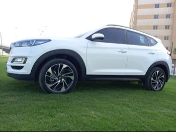 Hyundai  Tucson  4 Cylinder  SUV 4x4  White  2021