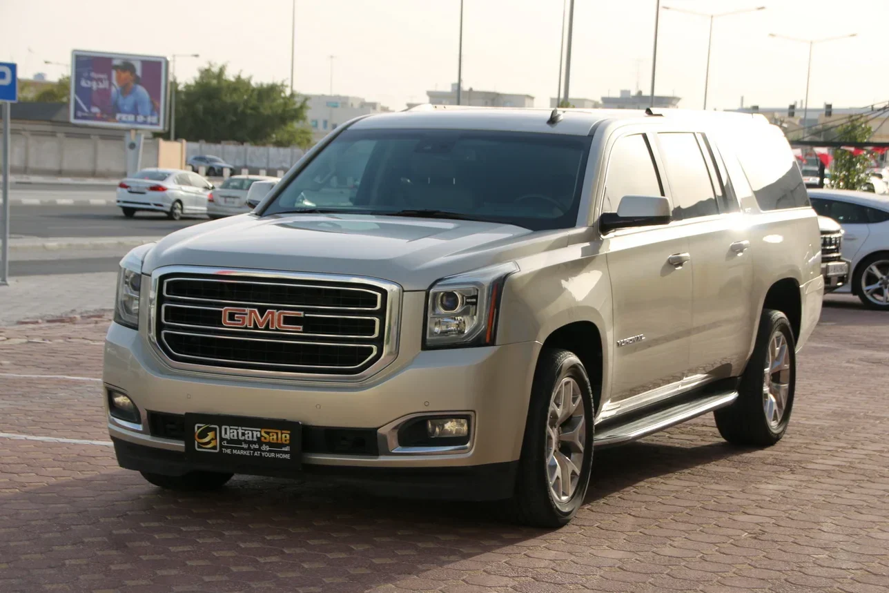 GMC  Yukon  XL  2015  Automatic  107,000 Km  8 Cylinder  Four Wheel Drive (4WD)  SUV  Gold