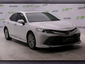 Toyota  Camry  2018  Automatic  150,000 Km  6 Cylinder  Front Wheel Drive (FWD)  Sedan  White