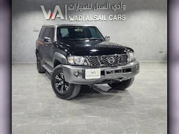 Nissan  Patrol  Super Safari  2023  Automatic  52,000 Km  6 Cylinder  Four Wheel Drive (4WD)  SUV  Black  With Warranty