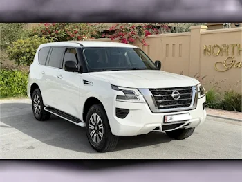 Nissan  Patrol  XE  2020  Automatic  120,000 Km  6 Cylinder  Four Wheel Drive (4WD)  SUV  White