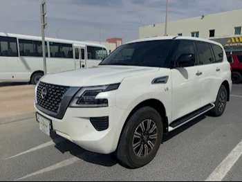 Nissan  Patrol  XE  2023  Automatic  29,000 Km  8 Cylinder  Four Wheel Drive (4WD)  SUV  White  With Warranty