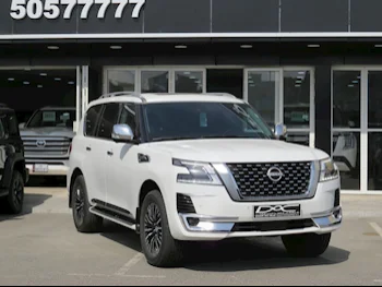 Nissan  Patrol  Platinum  2023  Automatic  23,000 Km  6 Cylinder  Four Wheel Drive (4WD)  SUV  White  With Warranty