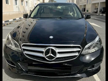 Mercedes-Benz  E-Class  200 AMG  2016  Automatic  98,600 Km  4 Cylinder  Rear Wheel Drive (RWD)  Sedan  Black