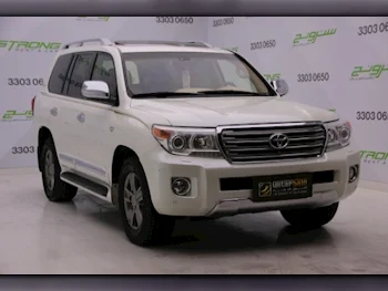  Toyota  Land Cruiser  VXR  2015  Automatic  214,000 Km  8 Cylinder  Four Wheel Drive (4WD)  SUV  Pearl  With Warranty