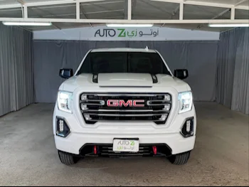GMC  Sierra  AT4  2022  Automatic  42,000 Km  8 Cylinder  Four Wheel Drive (4WD)  Pick Up  White  With Warranty