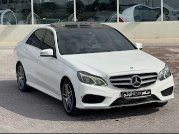 Mercedes-Benz  E-Class  300  2014  Automatic  139,000 Km  6 Cylinder  Rear Wheel Drive (RWD)  Sedan  White