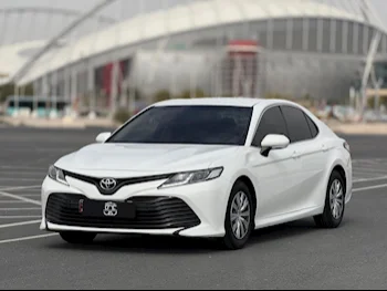 Toyota  Camry  LE  2018  Automatic  104,000 Km  4 Cylinder  Front Wheel Drive (FWD)  Sedan  White