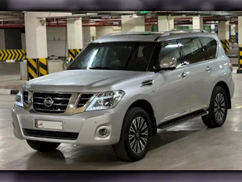 Nissan  Patrol  Platinum  2015  Automatic  136,000 Km  8 Cylinder  Four Wheel Drive (4WD)  SUV  Silver