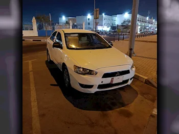 Mitsubishi  Lancer  EX  2014  Automatic  276,000 Km  4 Cylinder  Sedan  Black & Beige