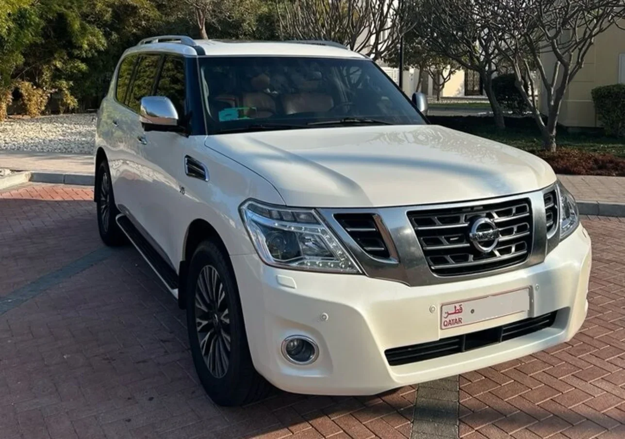 Nissan  Patrol  Platinum  2014  Automatic  203,000 Km  8 Cylinder  Four Wheel Drive (4WD)  SUV  White  With Warranty