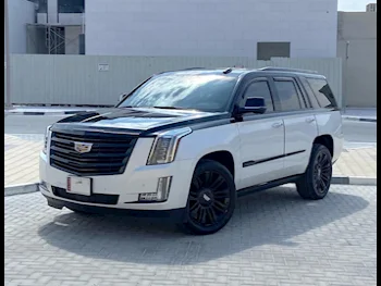 Cadillac  Escalade  Platinum  2016  Automatic  34,800 Km  8 Cylinder  Four Wheel Drive (4WD)  SUV  White