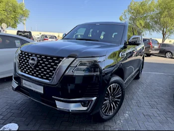 Nissan  Patrol  Platinum  2022  Automatic  48,000 Km  6 Cylinder  Four Wheel Drive (4WD)  SUV  Black  With Warranty