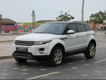  Land Rover  Evoque  2015  Automatic  144,000 Km  4 Cylinder  Four Wheel Drive (4WD)  SUV  White  With Warranty