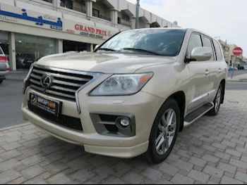 Lexus  LX  570  2014  Automatic  299,000 Km  8 Cylinder  Four Wheel Drive (4WD)  SUV  Gold