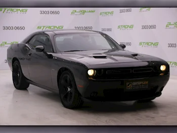 Dodge  Challenger  R/T  2016  Automatic  42,000 Km  8 Cylinder  Rear Wheel Drive (RWD)  Coupe / Sport  Black