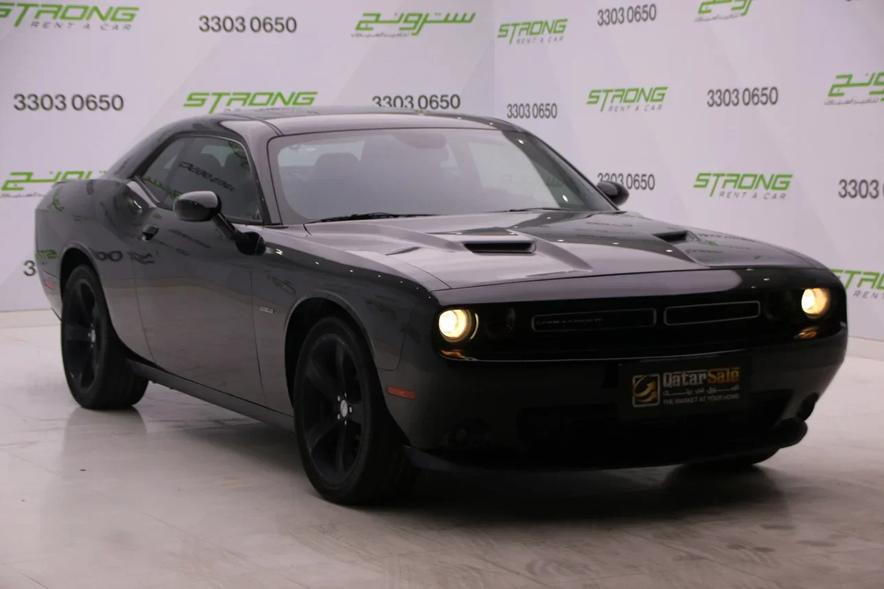 Dodge  Challenger  R/T  2016  Automatic  42,000 Km  8 Cylinder  Rear Wheel Drive (RWD)  Coupe / Sport  Black