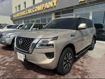 Nissan  Patrol  Titanium  2022  Automatic  13,000 Km  6 Cylinder  Four Wheel Drive (4WD)  SUV  Gold  With Warranty