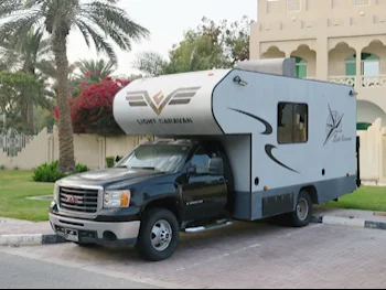 Caravan - Light Caravan  - Super Duty  - 2009  - Black and Gray  -Made in United States of America(USA)  - 23,000 Km