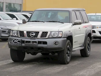 Nissan  Patrol  Super Safari  2021  Automatic  81,000 Km  6 Cylinder  Four Wheel Drive (4WD)  SUV  White