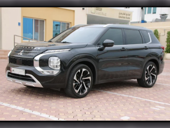 Mitsubishi  Outlander  Limited edition  2023  Automatic  80,000 Km  4 Cylinder  Four Wheel Drive (4WD)  SUV  Black  With Warranty