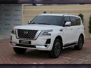 Nissan  Patrol  Platinum turbo  2023  Automatic  16,000 Km  6 Cylinder  Four Wheel Drive (4WD)  SUV  Pearl  With Warranty