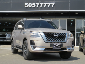 Nissan  Patrol  Titanium  2022  Automatic  61,000 Km  6 Cylinder  Four Wheel Drive (4WD)  SUV  Gold  With Warranty