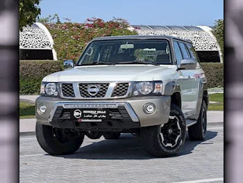 Nissan  Patrol  Super Safari  2021  Automatic  99,600 Km  6 Cylinder  Four Wheel Drive (4WD)  SUV  Off White  With Warranty