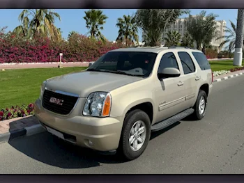 GMC  Yukon  2012  Automatic  220,000 Km  8 Cylinder  Four Wheel Drive (4WD)  SUV  Gold