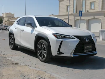 Lexus  UX  200  2023  Automatic  4,000 Km  4 Cylinder  Front Wheel Drive (FWD)  SUV  White  With Warranty