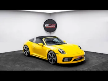 Porsche  911  Targa 4S  2021  Automatic  7,970 Km  6 Cylinder  Rear Wheel Drive (RWD)  Convertible  Yellow