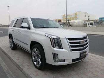 Cadillac  Escalade  2016  Automatic  217,000 Km  8 Cylinder  Four Wheel Drive (4WD)  SUV  White