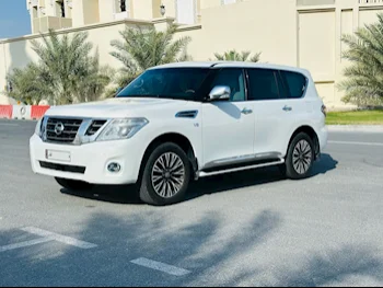 Nissan  Patrol  SE  2013  Automatic  199,000 Km  8 Cylinder  Four Wheel Drive (4WD)  SUV  White