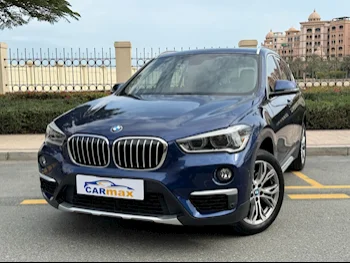 BMW  X-Series  X1  2019  Automatic  52,000 Km  4 Cylinder  Four Wheel Drive (4WD)  SUV  Dark Blue  With Warranty