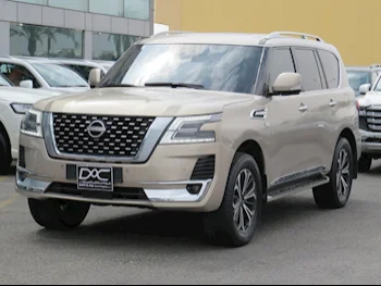 Nissan  Patrol  Titanium  2022  Automatic  54,000 Km  6 Cylinder  Four Wheel Drive (4WD)  SUV  Gold