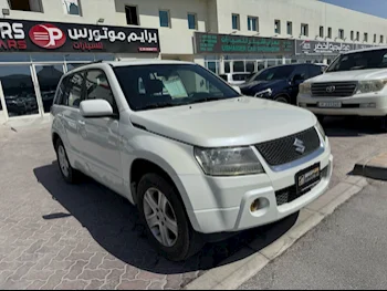 Suzuki  Grand Vitara  2007  Automatic  201,000 Km  4 Cylinder  Rear Wheel Drive (RWD)  SUV  White