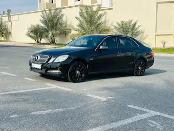 Mercedes-Benz  E-Class  200  2012  Automatic  148,000 Km  4 Cylinder  Rear Wheel Drive (RWD)  Sedan  Black