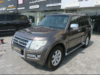  Mitsubishi  Pajero  2015  Automatic  205,000 Km  6 Cylinder  Four Wheel Drive (4WD)  SUV  Brown  With Warranty