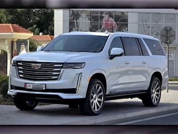  Cadillac  Escalade  Platinum  2021  Automatic  33,000 Km  8 Cylinder  Four Wheel Drive (4WD)  SUV  White  With Warranty