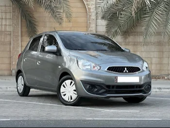 Mitsubishi  Mirage  2020  Automatic  50,000 Km  3 Cylinder  Rear Wheel Drive (RWD)  SUV  Light Gray