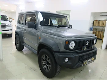 Suzuki  Jimny  2021  Automatic  103,000 Km  4 Cylinder  Four Wheel Drive (4WD)  SUV  Gray