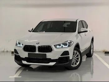 BMW  X-Series  X2  2023  Automatic  28,000 Km  4 Cylinder  Front Wheel Drive (FWD)  SUV  White  With Warranty